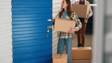 Large cardboard storage boxes arranged for packing and moving at a facility