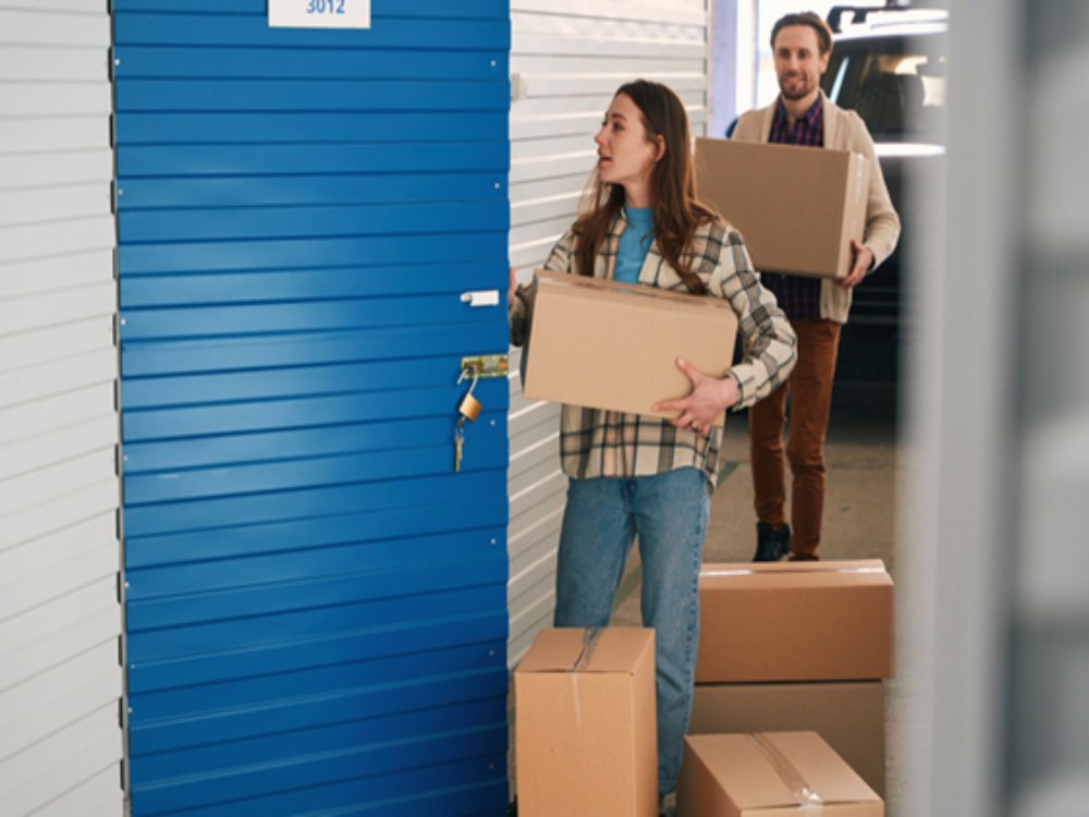Large cardboard storage boxes arranged for packing and moving at a facility